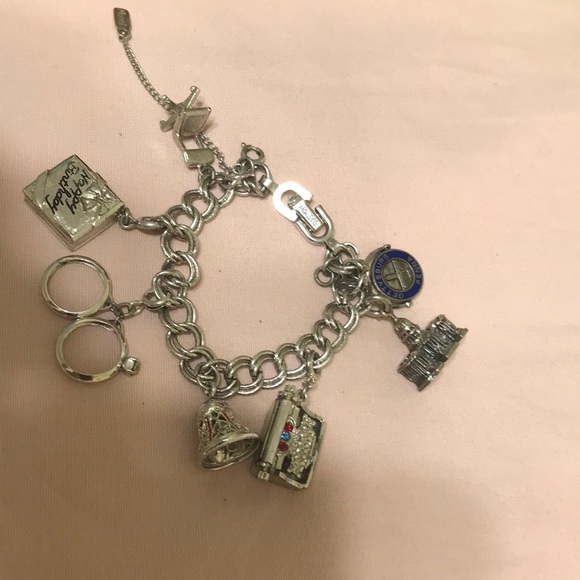 Silver Monet charm bracelet from 1970, excellent condition.